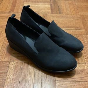 Black loafers with wedge heel